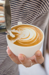 Barista making a cup of coffee