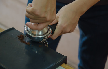 Barista making a cup of coffee