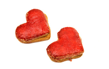 Cookies hearts in red icing isolated