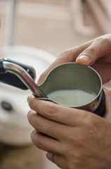 Barista making a cup of coffee