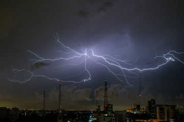 Lightning storm over city
