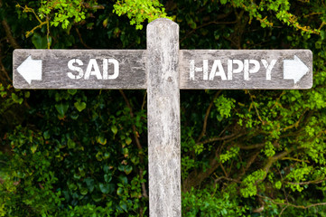 SAD versus HAPPY directional signs