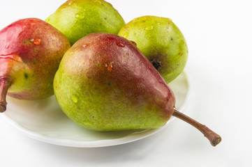 colorful pears in the dish