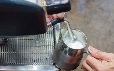 Barista making a cup of coffee