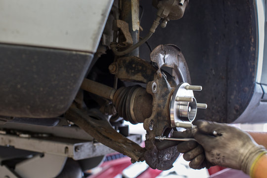 Inside a garage - changing wheels/tires 