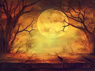 Spooky forest with full moon and wooden table - 121044712