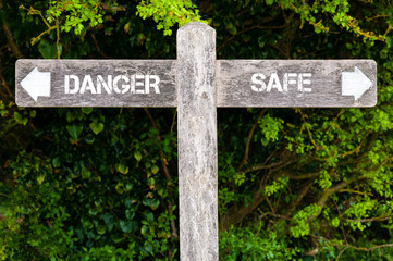 DANGER versus SAFE directional signs