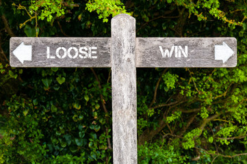LOOSE versus WIN directional signs