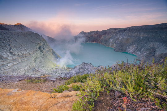 Sulfur fumes from the crater and Sunrise at   Kawah Ijen Volcano