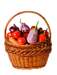 Vegetables in basket isolated on white background
