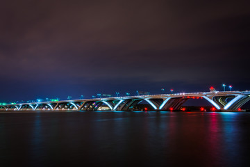 The Woodrow Wilson Bridge and Potomac River at night, seen from