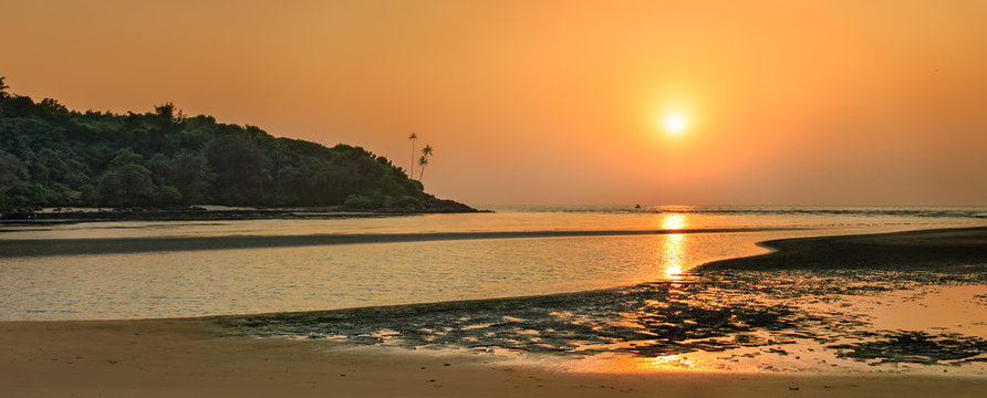 Beach at sunset, Goa, India