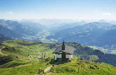 Little church on Kitzbuhel peak, Alps mountains, Austria
