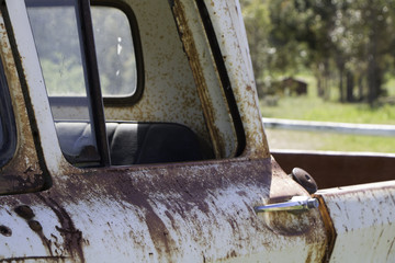 rusted vintage truck abandoned outdoors
