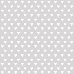 Seamless vector pattern with white hearts on pastel background