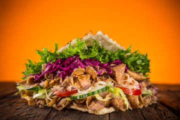 close up of kebab sandwich.
