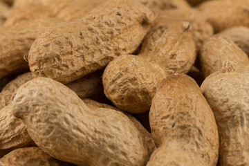 Pile of peanuts shells close up