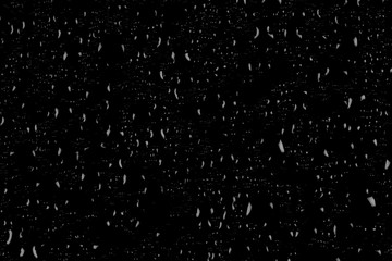 Drops of water on a dark glass