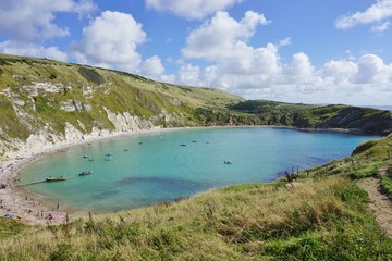 Obraz premium Lulworth Cove on the English Jurassic Coast in Dorset, England