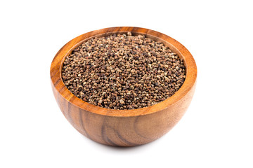 Decorticated cardamom seeds in a bowl