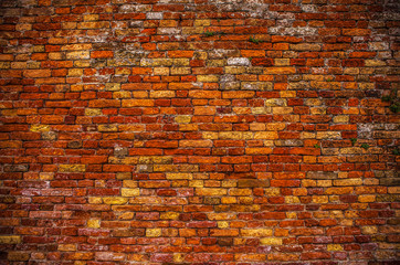 Ancient brick wall as background.