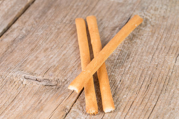 bread sticks grissini on wooden background