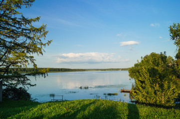 green field and blue sky