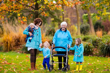 Senior lady with walker enjoying family visit