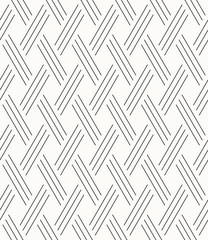 seamless abstract vector pattern of weaved  strips.