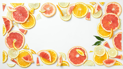citrus fruit frame of  slices isolated on white background