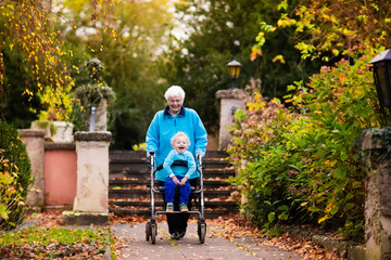 Senior lady with walker enjoying family visit