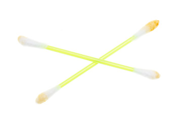 dirty ear sticks on a white background