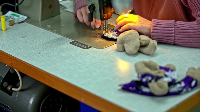 Sewing together plush body parts