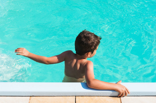 Kid in swimming pool