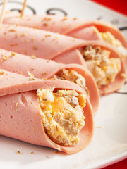 Rolls with ham, cheese and eggs. Vertical shot, close up
