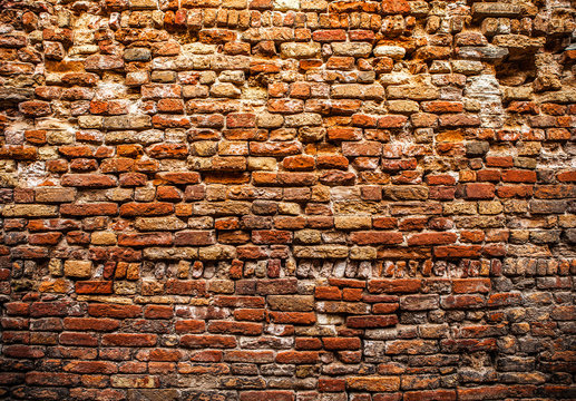 Ancient brick wall as background.