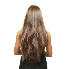Fototapeta premium Woman with long hair on white background