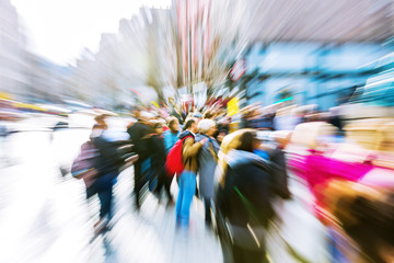 crowd of people in the city with zoom effect
