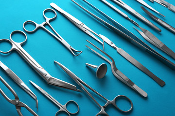 Flat lay of medical instruments on blue background