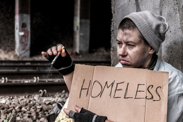 Homeless woman smoking