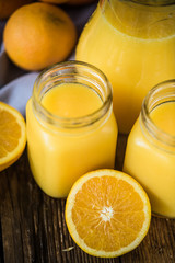 Fototapeta na wymiar fresh hand squeezed natural orange juice