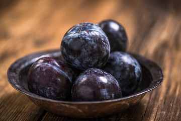 dark blue ripe plums