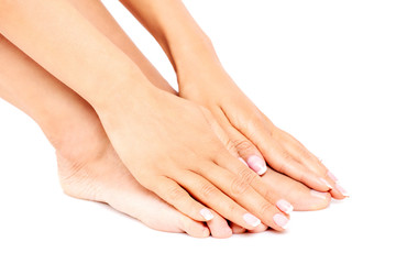 Young woman touching her feet