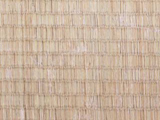 Seamless picture of the surface of worn out Japanese tatami mat