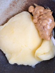 Cornmeal porrige called Polenta with crunch peanut