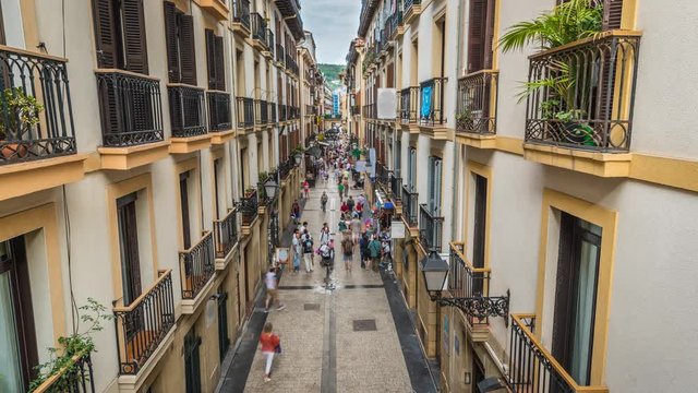 People walking on San Sebastian Old Town Crowded Street, Spain.Time Lapse