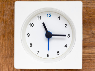 Series of the sequence of time on the simple white analog clock