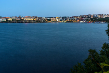 Fototapeta premium Twinlight view of beach and new part of Sozopol, Burgas Region, Bulgaria