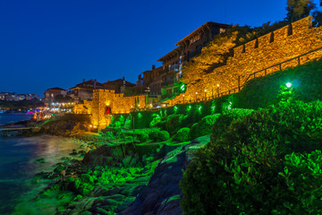 Night photo of ruins of reconstructed gate part of Sozopol ancient fortifications, Bulgaria