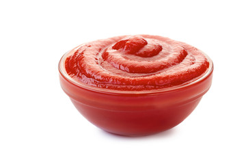 Bowl of ketchup or tomato sauce on white